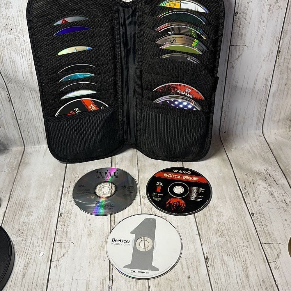 Awesome lot of Classic CDs and Movies Breaking Bad‎ AC/DC Foo Fighters Bee Gees